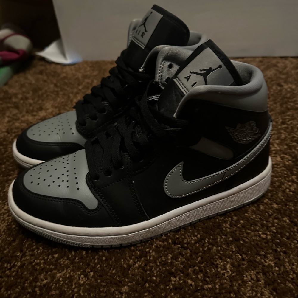black and grey high top jordan ones